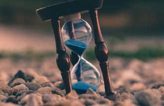 Egg timer on a pebble beach